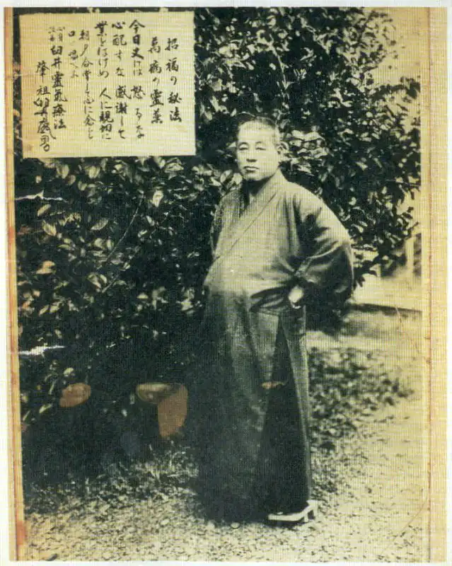 Mikao Usui met de Reiki beginselen